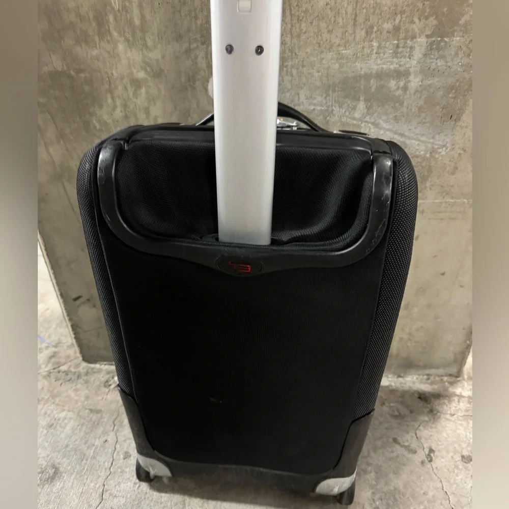 TUMI Carry On Rolling Suitcase